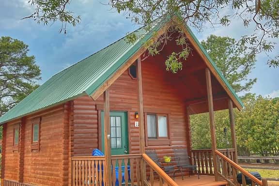 Cabin 11-Lakefront Sandy Beach-King Bed-Full Kitchen-Sleeping Loft-AC/Heat-Sleeps 6 - Image 1